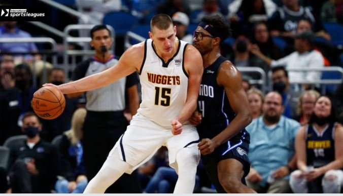Nikola Jokic's 3-pointer leads the Nuggets to a win over the Warriors